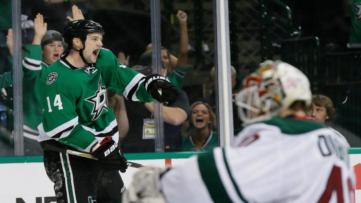 Stars left wing Jamie Benn celebrates hsi breakaway goal against Wild goalie Devan Dubnyk in the third period of in Game 2.