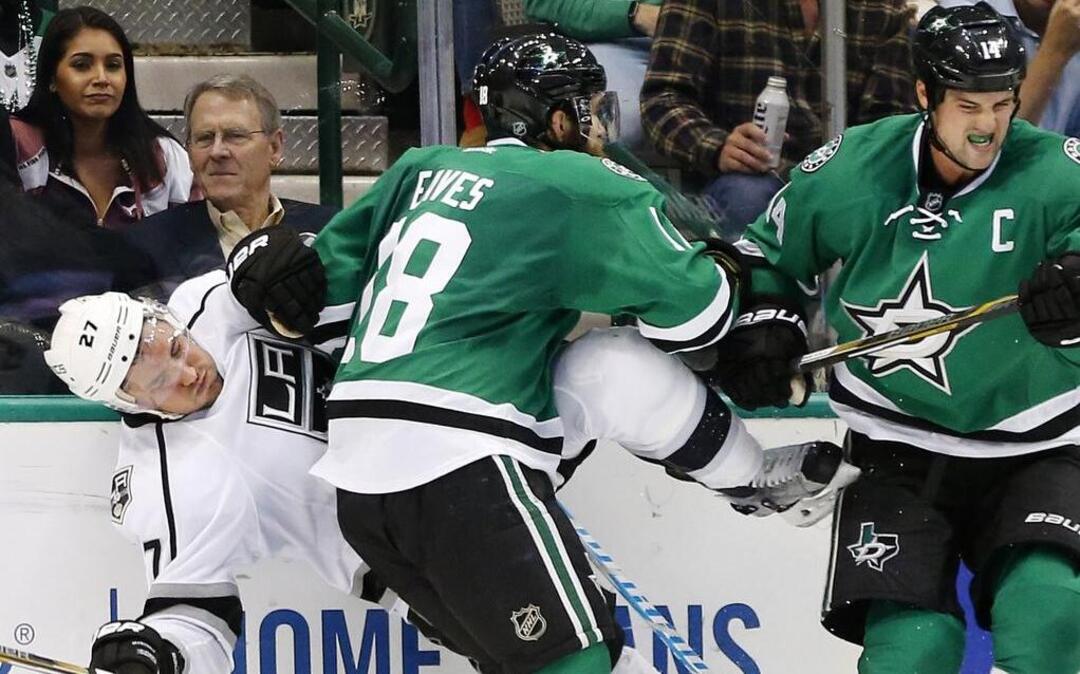 Stars forward Patrick Eaves, center, slamming the LA Kings’ Alec Martinez in Thursday’s game, has been slowed by a lower body injury and hopes to return for Tuesday’s game against Winnipeg.