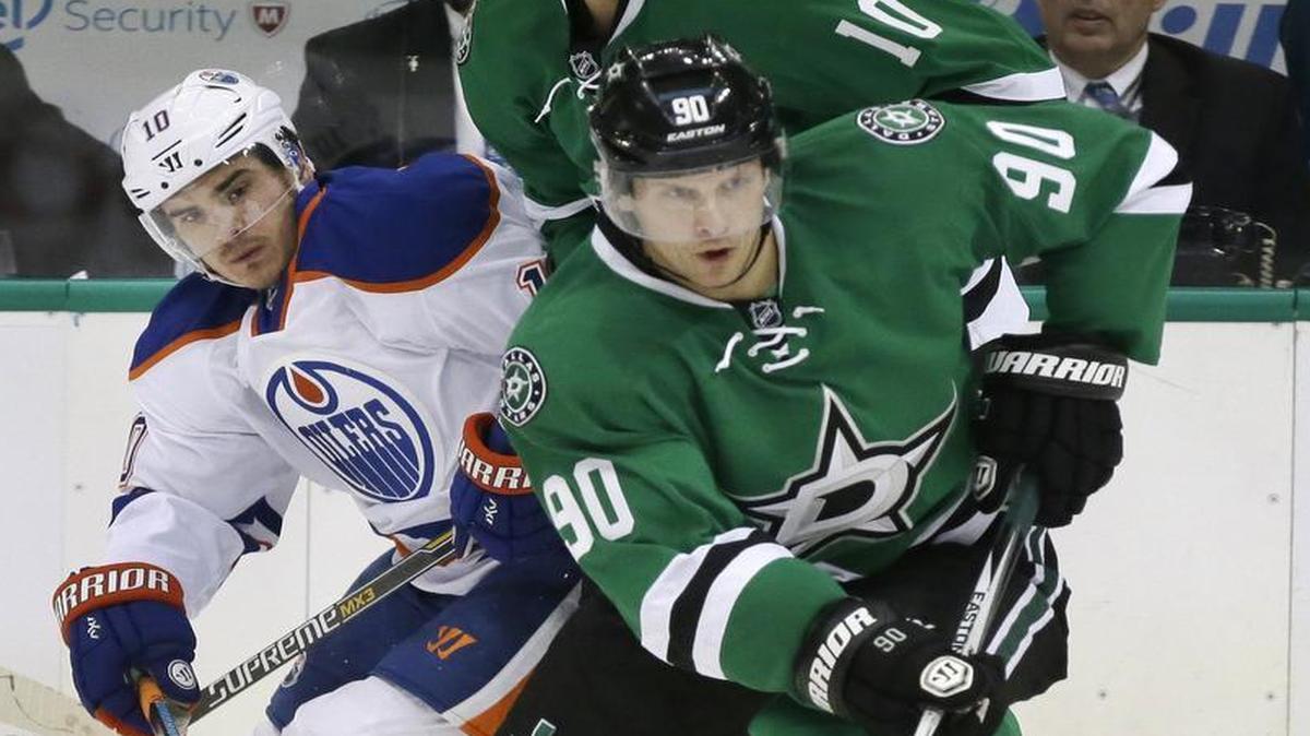 
Stars center Jason Spezza (90) takes control of the puck in front of Edmonton Oilers right wing Nail Yakupov (10) during the first period. Spezza had a hat trick for the Stars, including the go-ahead goal in the fourth period.
