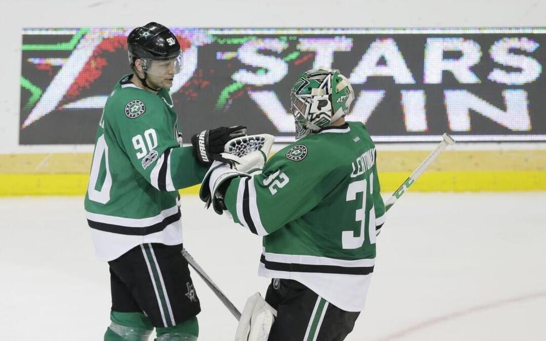 Dallas Stars goalie Kari Lehtonen is congratulated by teammate Jason Spezza after an overtime shootout win. The Stars finished the season 34-37-11.