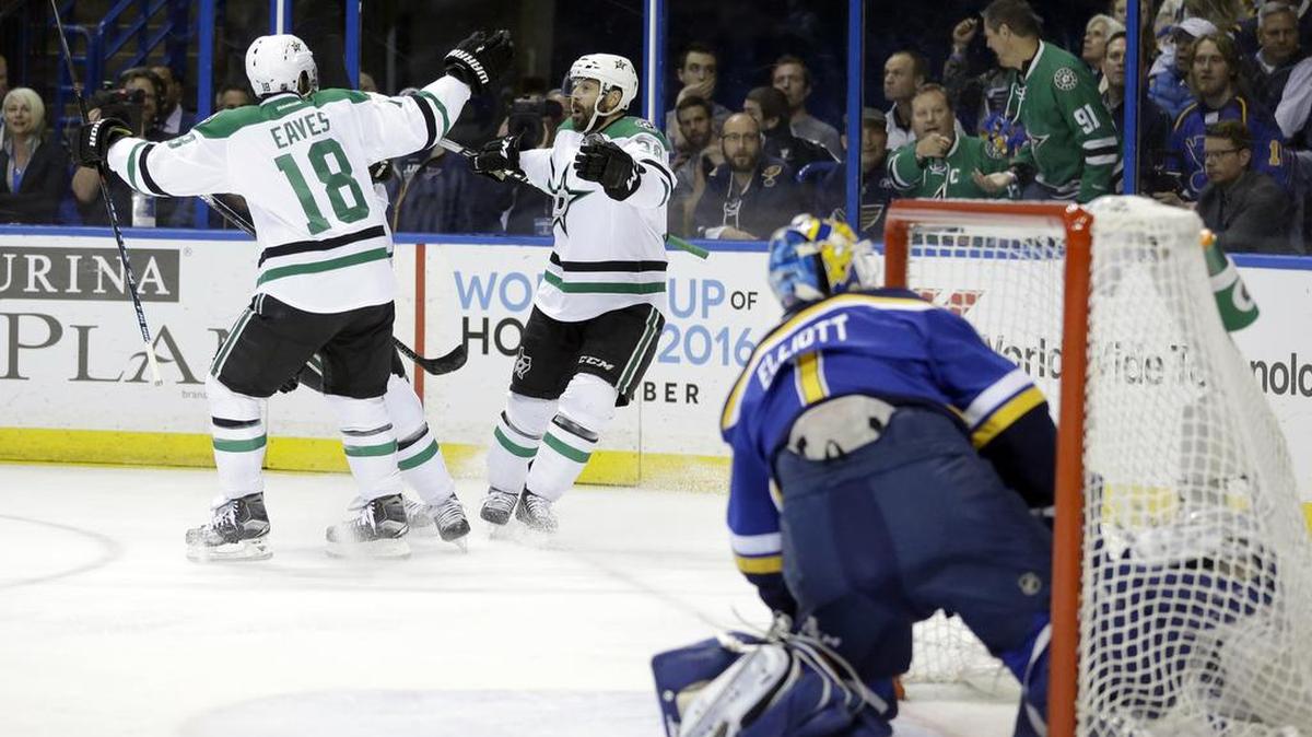 Vernon Fiddler, left, and Stars teammate Patrick Eaves celebrate a first-period goal against Blues goaltender Brian Elliott on Monday in Game 6. The Stars won to force a Game 7 on Wednesday at American Airlines Center.