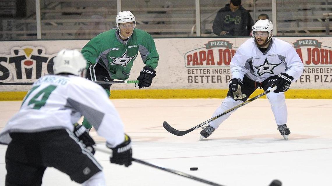 
Michael Hill of Fort Worth, right, is participating in the Dallas Stars Development Camp this week in Frisco. 
