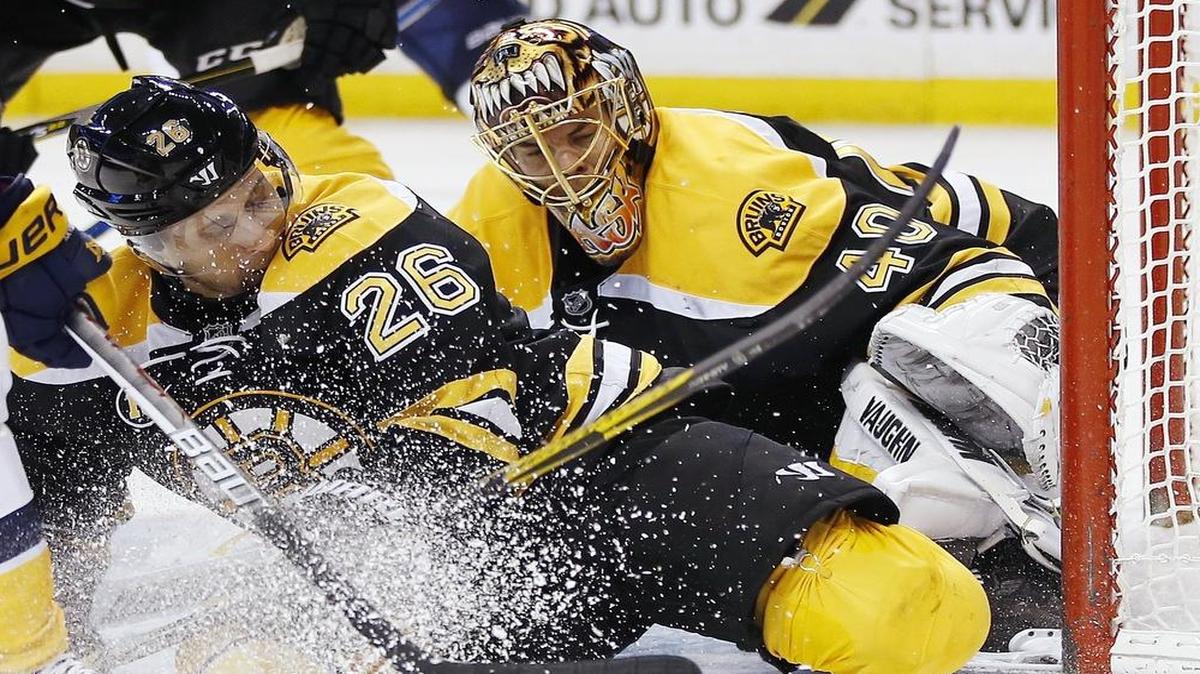 John-Michael Liles, left, tries to help Bruins goalie Tuukka Rask block the puck in Boston’s 4-1 victory over Montreal on Tuesday. The Bruins play host to the Dallas Stars on Thursday (6:30 p.m., NBCSN).