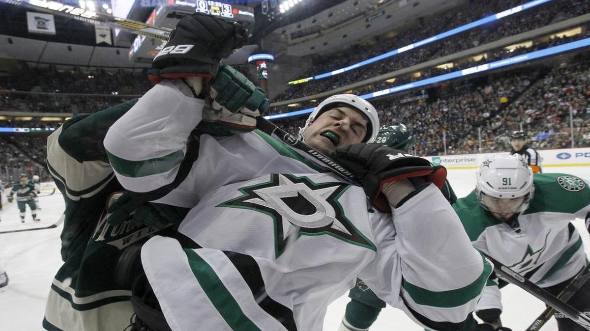 Stars captain Jamie Benn, front, and Minnesota Wild center Mikko Koivu, left, will likely exchange holiday greetings again when the teams meet Monday night in Minnesota. Dallas has won in overtime in both meetings this season.