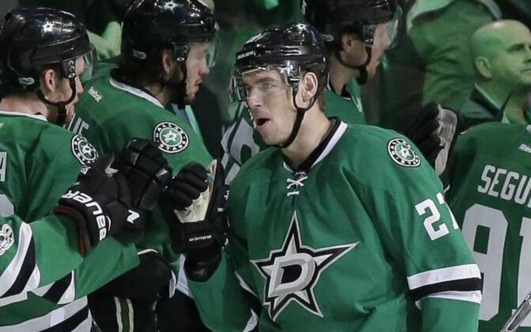 Dallas Stars right wing Adam Cracknell (27) is congratulated after scoring a goal against the San Jose Sharks during the second period of an NHL hockey game in Dallas, Friday, March 24, 2017.