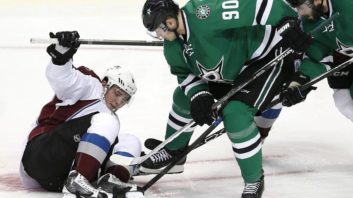 Stars forward Jason Spezza (90) and defenseman Jason Demers try to play the puck from under Avalanche center Matt Duchene in their meeting last month. The teams play Thursday night in Denver.