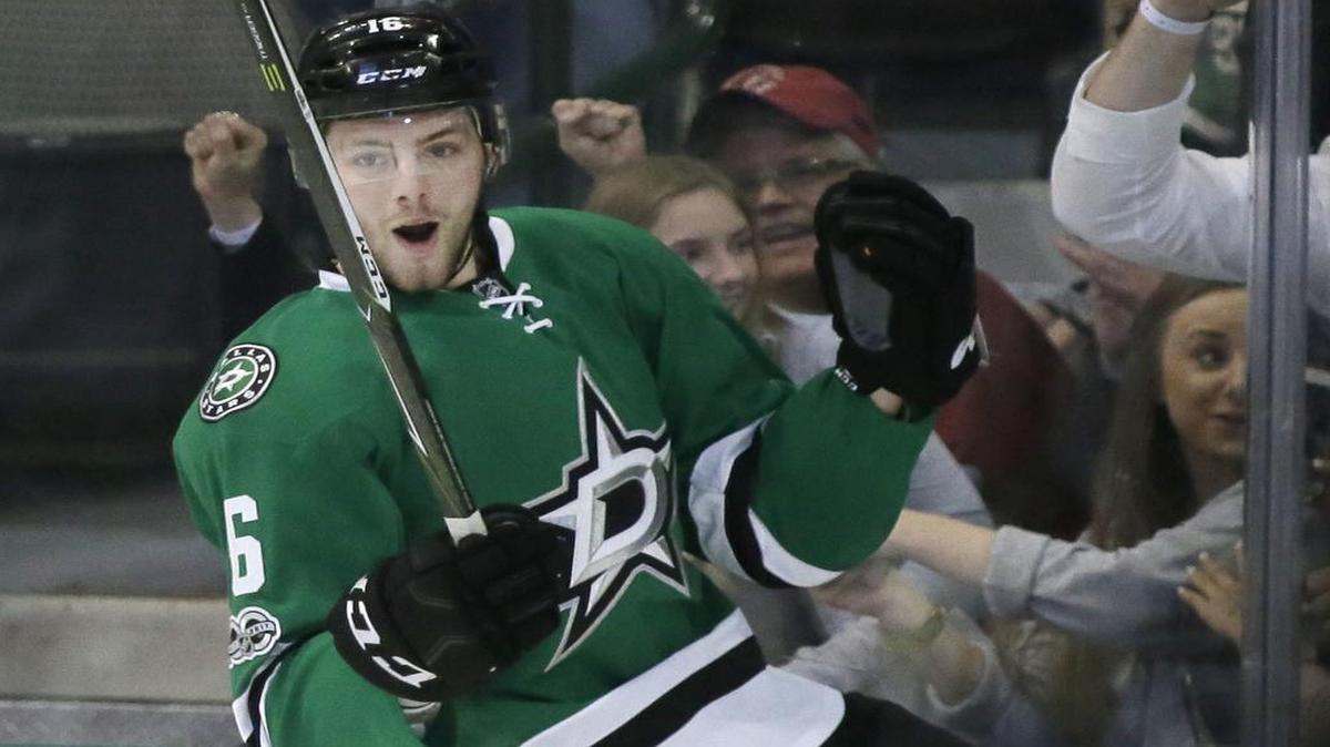 Dallas Stars center Jason Dickinson celebrates his first goal of the season, which came in overtime as the Stars defeated the Arizona Coyotes 3-2 on Tuesday.