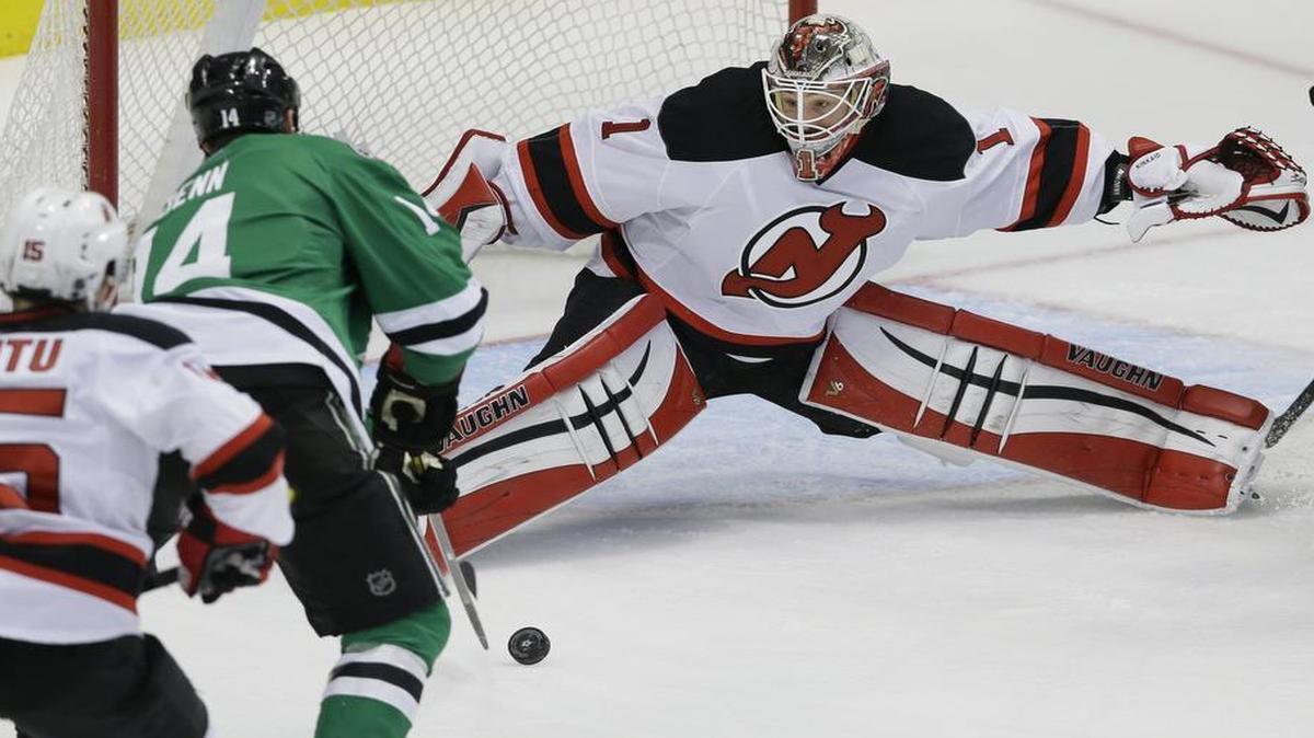 Devils goalie Keith Kinkaid defends the goal against a shot by Stars left wing Jamie Benn during Friday’s game in Dallas.