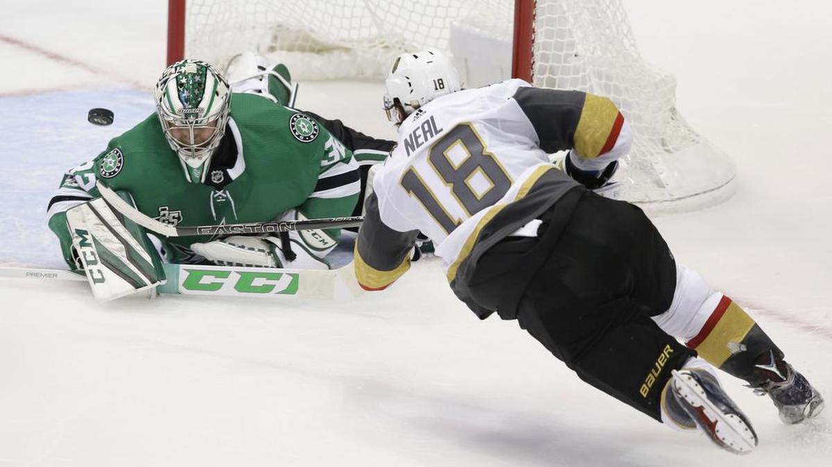 Former Stars player James Neal (18) scores the game-winning goal late in the third period against Dallas goalie Kari Lehtonen. The expansion Vegas Golden Knights won the season opening game 2-1 in Dallas.
