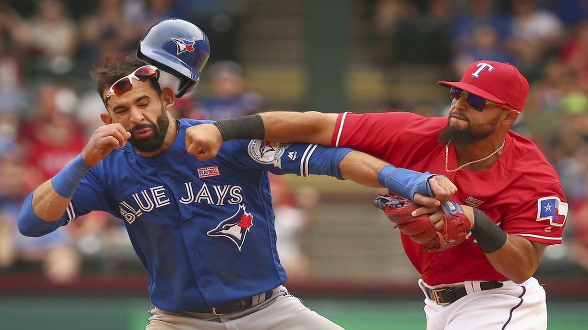 The Blue Jays and Rangers will duke it out for their first series this weekend in Toronto in the wake of last year’s skirmish between Jose Bautista, left, and Rougned Odor. Saturday’s game will be televised at noon on Fox Sports Southwest.