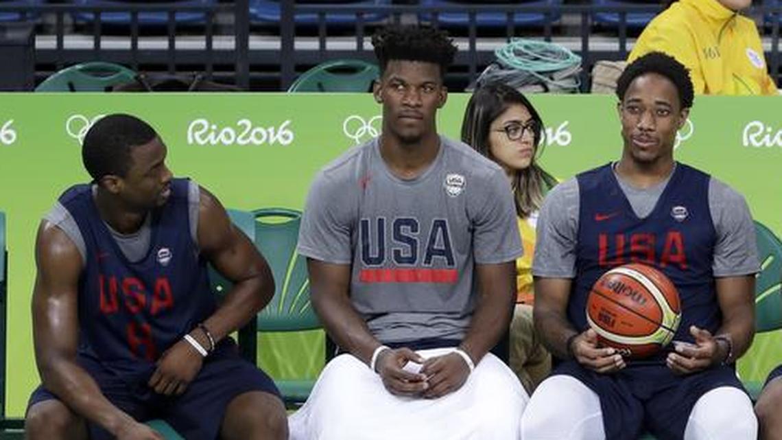 Team USA’s Harrison Barnes, Jimmy Butler, DeMar DeRozan, DeMarcus Cousins and DeAndre Jordan take a timeout during Thursday basketball practice in Rio. The team’s first game is Saturday vs. China.