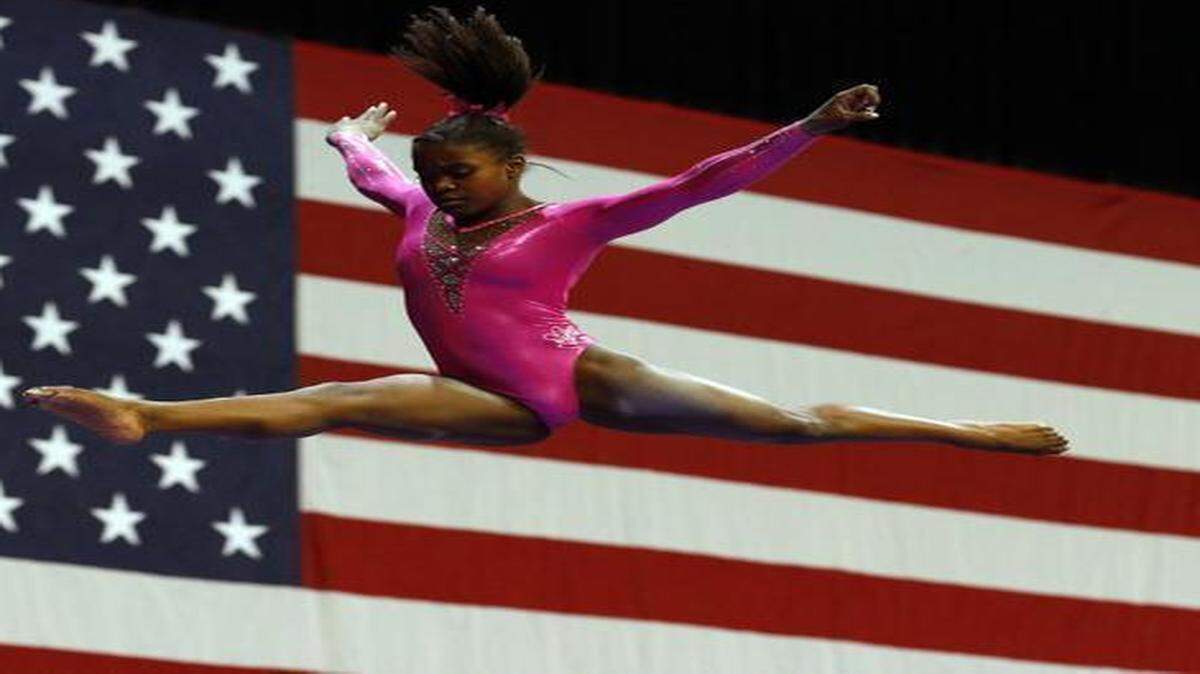 
Kiya Johnson of DeSoto, who won the junior women all-around, said she knew she had a shot at the podium once she landed her dismount on the vault, her favorite event. 


