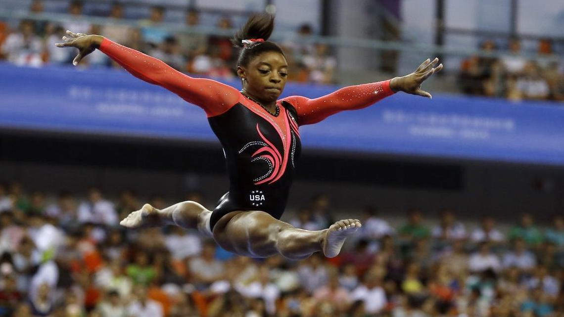 Simone Biles has won three consecutive world all-around titles, a first in her sport, and her 10 world championship gold medals rank as the most all time for any woman.