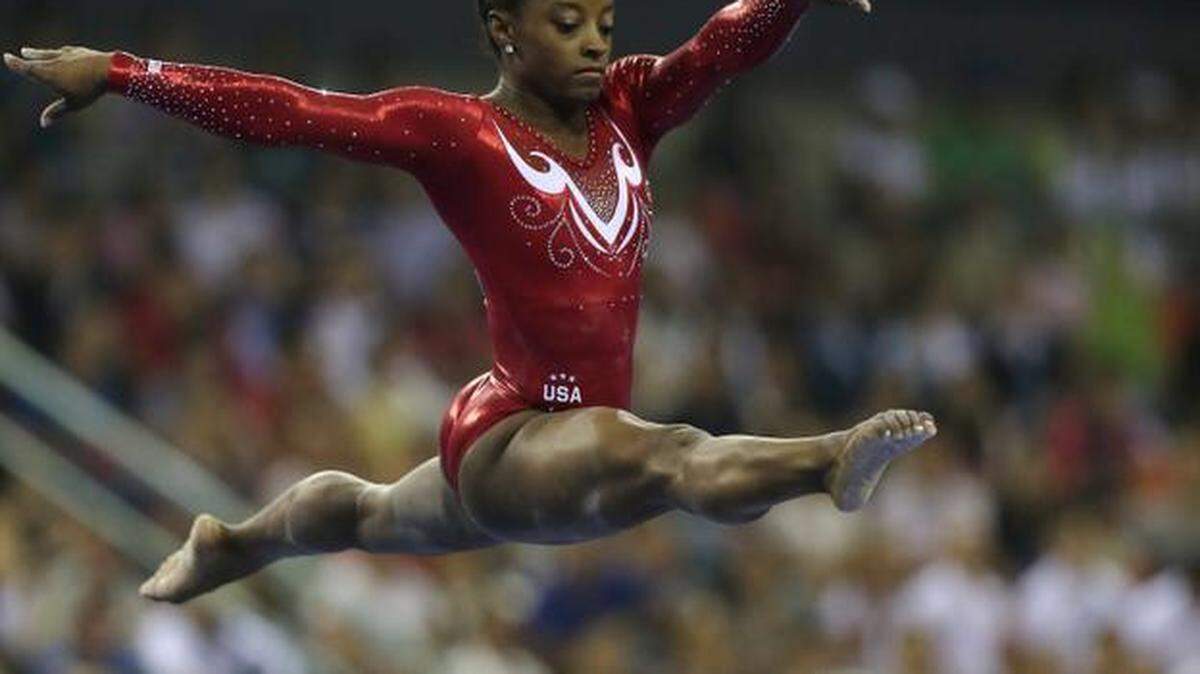 
Two-time worlsd all-around champion Simone Biles of the United States will look to solidify her spot on Team USA when she competes in the American Cup on March 7 in Arlington. 
