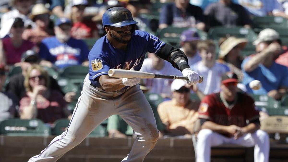 Delino DeShields, bunting during a game last week, and the Texas Rangers take on the San Diego Padres on Monday in Peoria, Ariz., in a Cactus League matchup. Coverage begins at 9 p.m. on FSSW Plus.