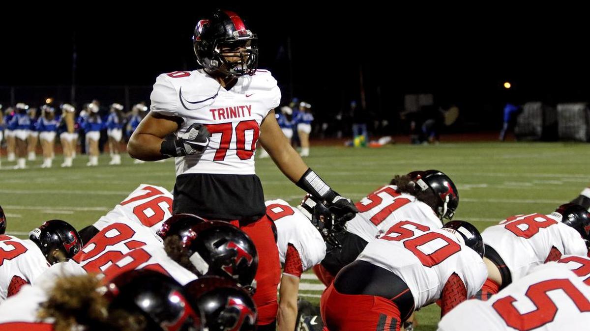 Trinity offensive lineman Jason Vakasiuola (70)