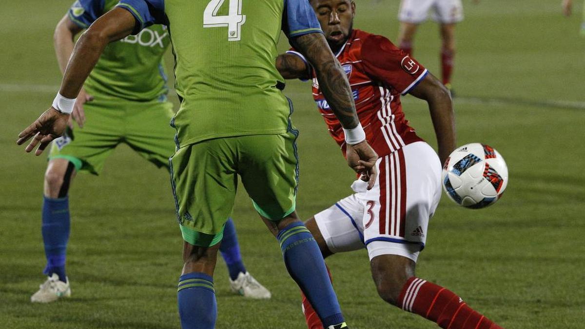 Midfielder Kellyn Acosta, at right in a game last month against Seattle, and his FC Dallas teammates try to maneuver past the Houston Dynamo in a Major League Soccer match at 8 p.m. Thursday in Frisco.