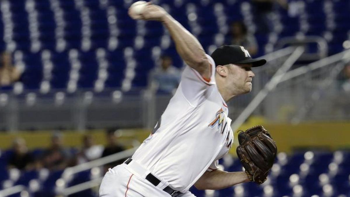 Miami Marlins starting pitcher Andrew Cashner throws against the Philadelphia Phillies, in Miami. Cashner is back in his native Texas after signing with the Texas Rangers. ,