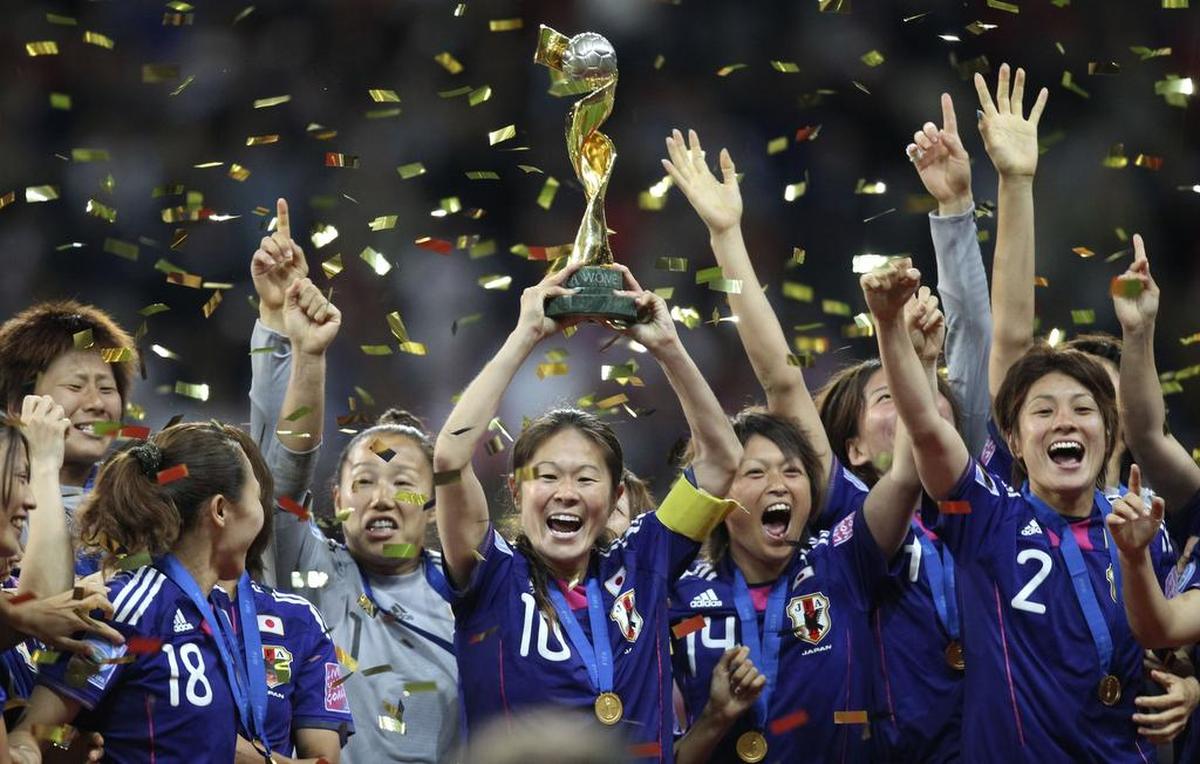 Japan players celebrate after defeating the United States in the 2011 World Cup final. 