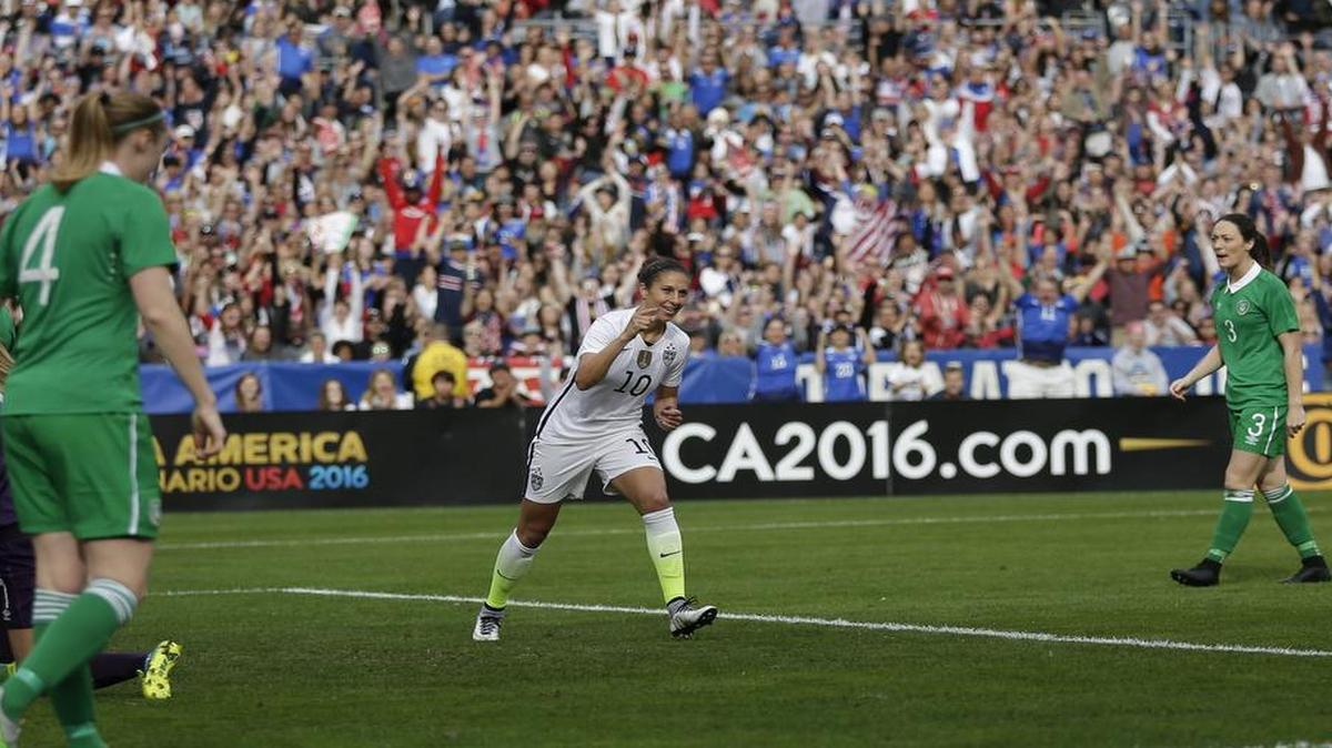Carli Lloyd, center, tallied a hat trick in the first 28 minutes Jan. 23 when the United States routed Ireland 5-0 in an international friendly in San Diego.