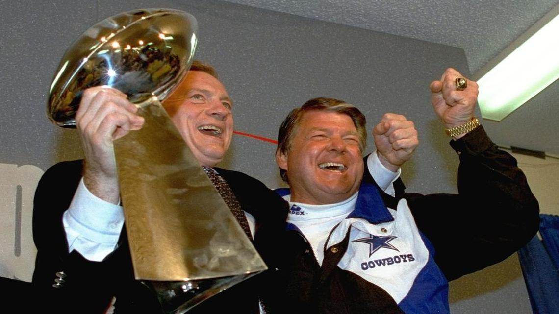 Cowboys owner Jerry Jones, left, hoists the Vince Lombari Trophy alongside coach Jimmy Johnson after their 52-17 Super Bowl victory over the Buffalo Bills on Jan. 31, 1993. Jones is a finalist for the Pro Football Hall of Fame.