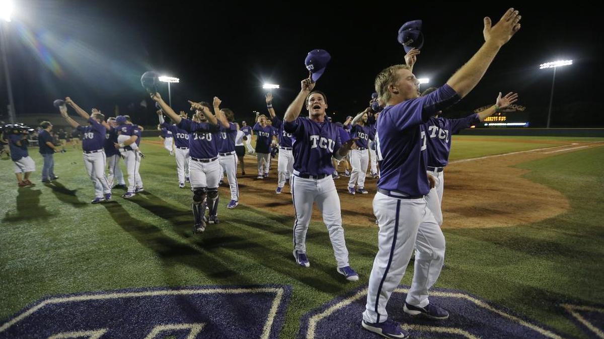 
TCU players celebrate after coming back to beat North Carolina State 9-8 in 10 innings late Monday night. 
