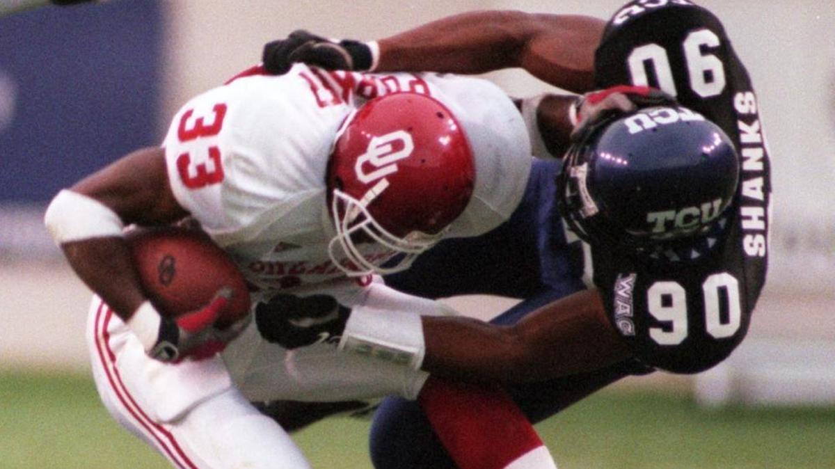 TCU and Oklahoma met twice when each was struggling in the late 1990s. Pictured is TCU’s Doug Shanks tackling Oklahoma’s De’Mond Parker during OU’s 10-9 victory in 1998 in Fort Worth.