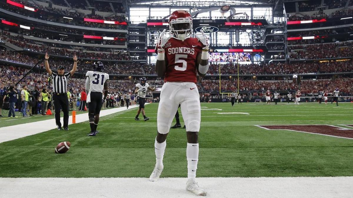Oklahoma wide receiver Marquise Brown’s third-quarter touchdown catch put the Sooners ahead by 21 points in Saturday’s Big 12 championship game. OU won 41-17.