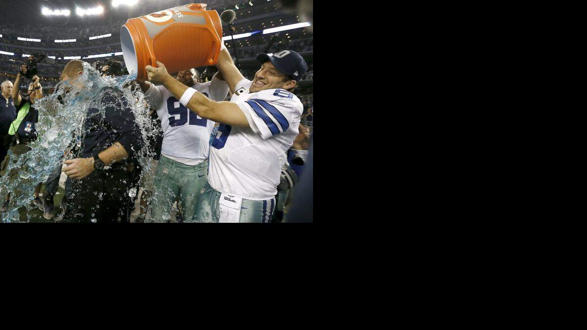 
Jason Garrett gets the championship shower.
