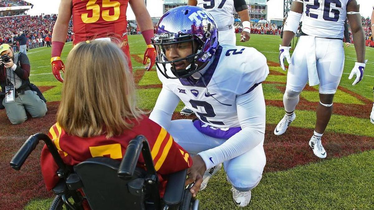 This photo of TCU quarterback Trevone Boykin’s pregame meeting with Iowa State fan Abby Faber has become a media sensation.