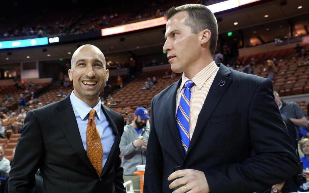 UTA coach Scott Cross, right, and the Mavericks took down Texas coach Shaka Smart and the Longhorns on Nov. 29. “I had that on my bucket list,” Cross said of the program’s first victory over Texas.