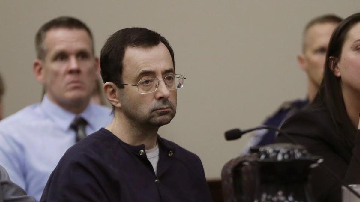 Larry Nassar sits during his sentencing hearing in Lansing, Mich. The former sports doctor who admitted molesting some of the nation’s top gymnasts for years was sentenced to 40 to 175 years in prison.
