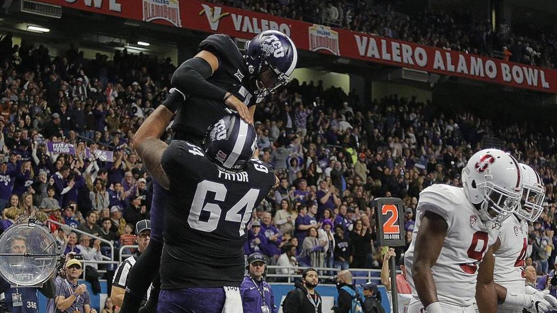 TCU quarterback Kenny Hill, celebrating with guard Matt Pryor after running for a touchdown Thursday night in the Alamo Bowl, also threw a TD pass and caught one to pull off the rare trio for the second time this season.