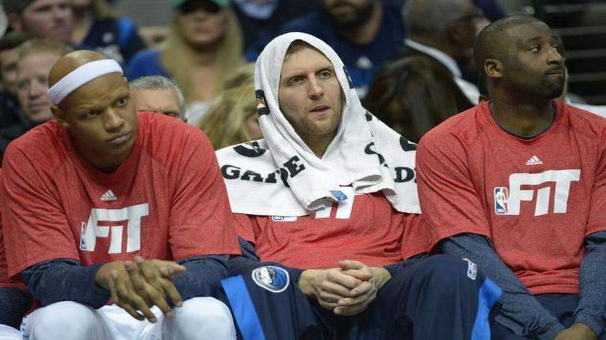 
Dirk Nowitzki, center, has been around  long enough to know the Mavericks have a lot of work to do. 
