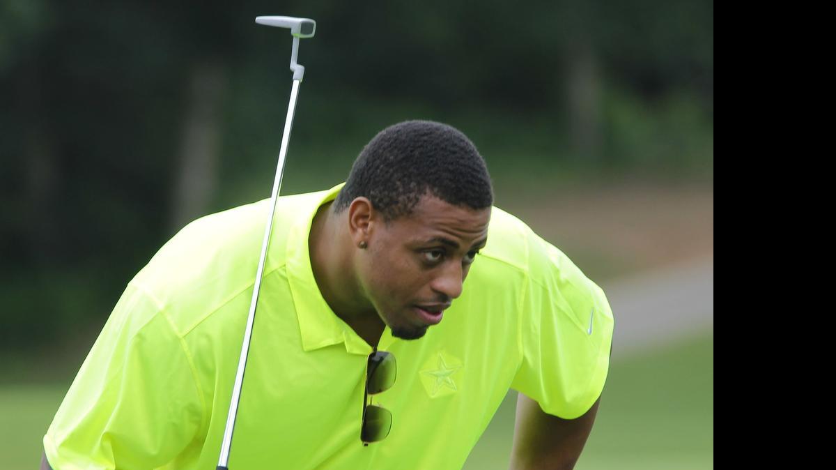 
Greg Hardy, at a team golf event Wednesday, has ability but also the potential to spoil locker room chemistry.
