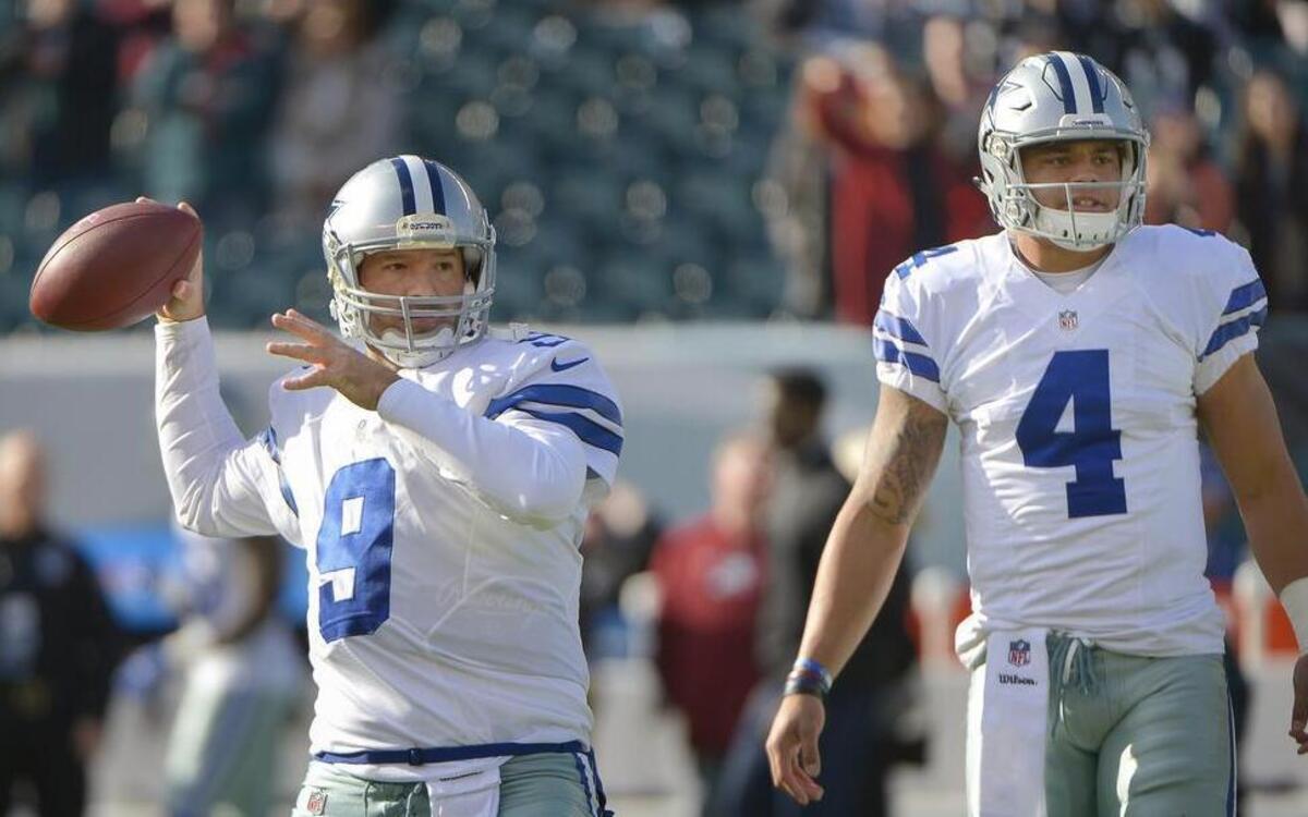 Dallas Cowboys quarterbacks Tony Romo and Dak Prescott practice before a January game against the Eagles in Philadelphia.