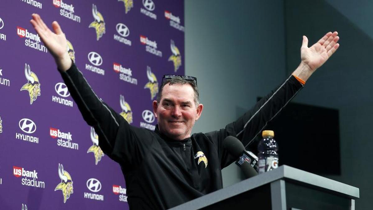 A triumphant Minnesota Vikings coach Mike Zimmer waves at fans after Sunday’s 29-24 victory over the New Orleans Saints in the divisional playoffs.