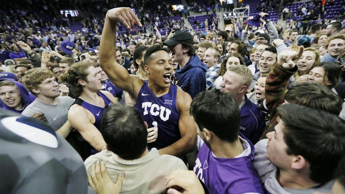 TCU guard Desmond Bane (1) celebrates with fans after an 82-73 win over West Virginia on Monday.