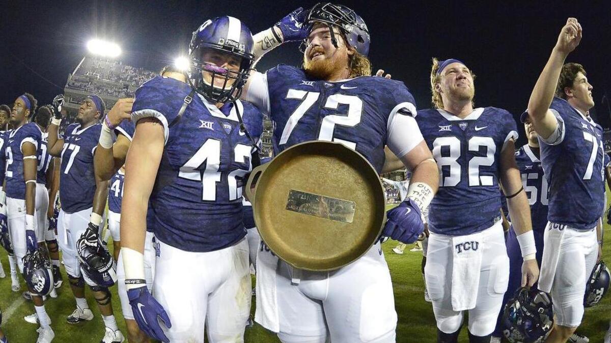 Ty Summers and Bobby Thompson helped TCU retain the Iron Skillet last year as the Horned Frogs defeated SMU 56-37.