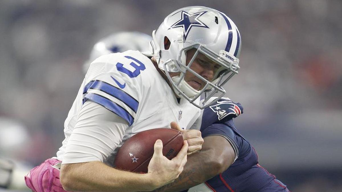 
Dallas Cowboys quarterback Brandon Weeden is sacked by New England Patriots linebacker Dont’a Hightower in the first quarter. Weeden appears to be at the end of his starting run. 
