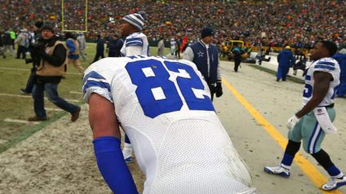 
Tight end Jason Witten slumps over on the sideline after Sunday’s game ended in a crushing 26-21 loss to the Packers.



