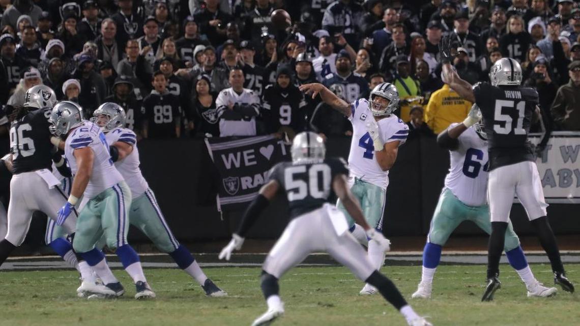 Dallas Cowboys quarterback Dak Prescott (4) attempts a pass against the Raiders in Oakland on Sunday night.