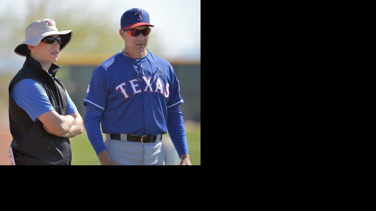 
Jon Daniels, left, could risk undercutting the authority of news manager Jeff Banister if he decides to address the team again in the clubhouse.


