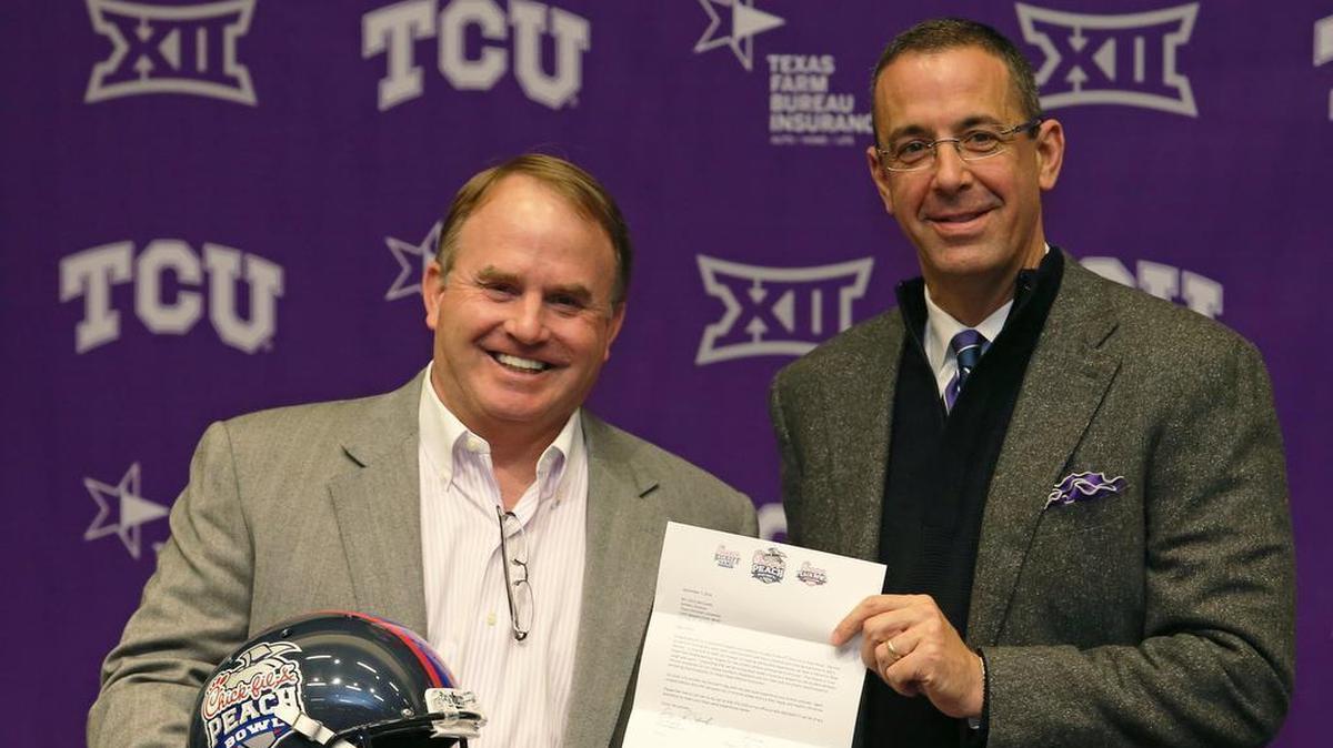 TCU football coach Gary Patterson (left) and former TCU AD Chris Del Conte at an appearance for the Peach Bowl. Del Conte announced his decision to leave for Texas, which he will formally accept on Monday.