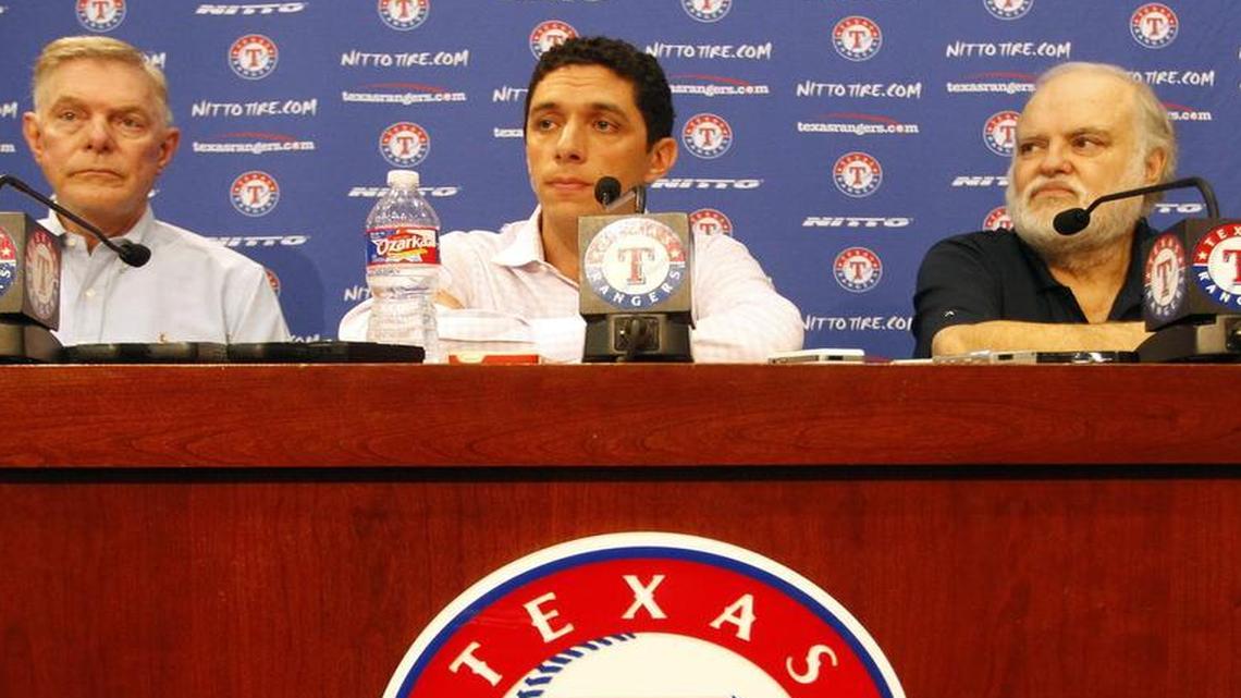 
Co-owners Ray Davis, left, and Bob Simpson, right, are committed to GM Jon Daniels’ plan.
