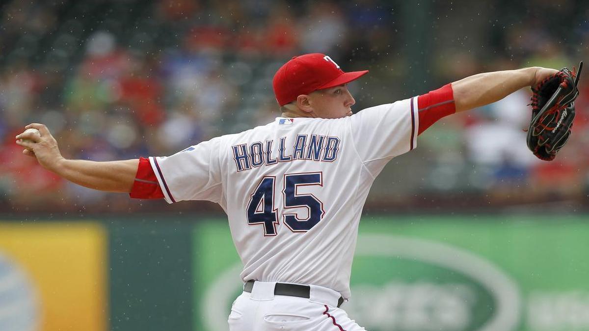 
Derek Holland showed command and grit while striking out six and walking none Wednesday. “I feel like I’m back,” he said.


