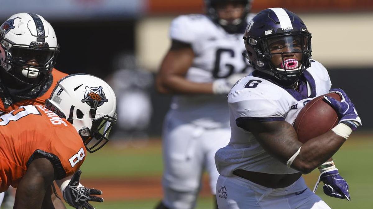 TCU running back Darius Anderson, right, ran for 160 yards and three touchdowns in a 44-31 upset of No. 6 Oklahoma State.