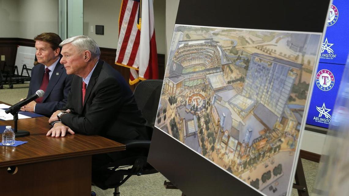 Arlington Mayor Jeff Williams, left, and Rangers co-owner Ray Davis announce on Friday that the Rangers will stay in Arlington and will build a new stadium across Randol Mill Road from Globe Life Park.