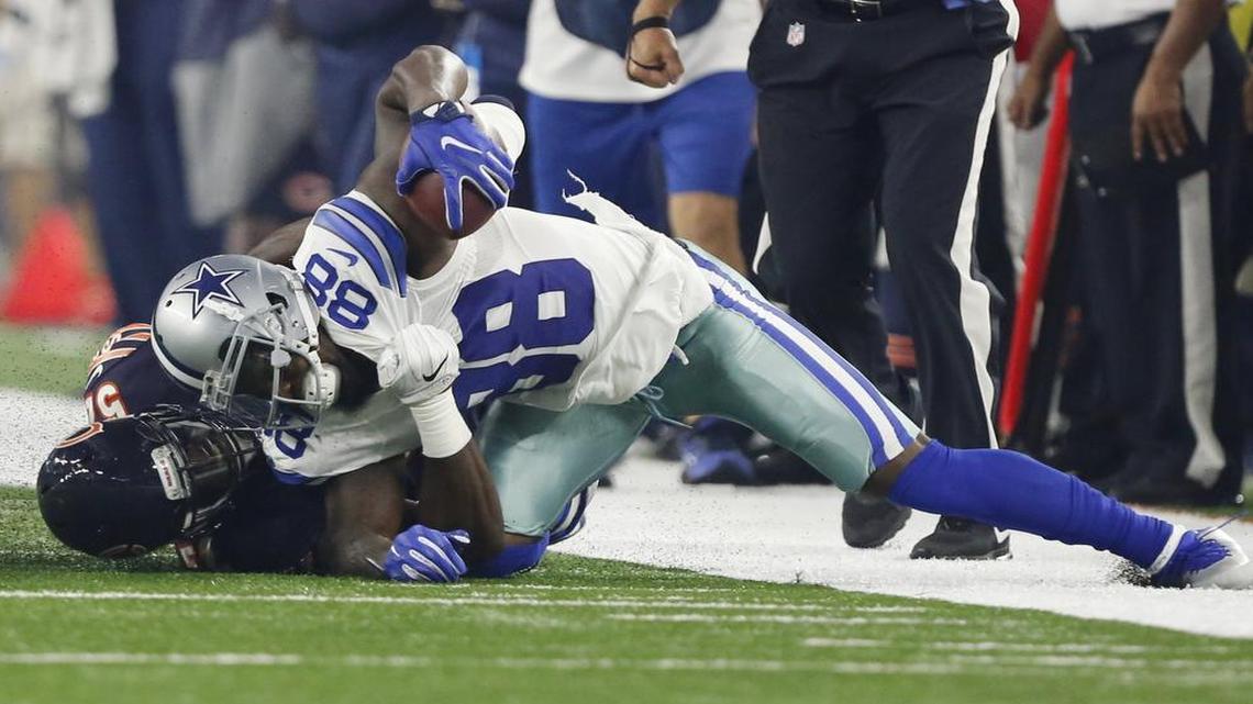 Dez Bryant injures his knee on the second play of the game Sunday night against the Bears.