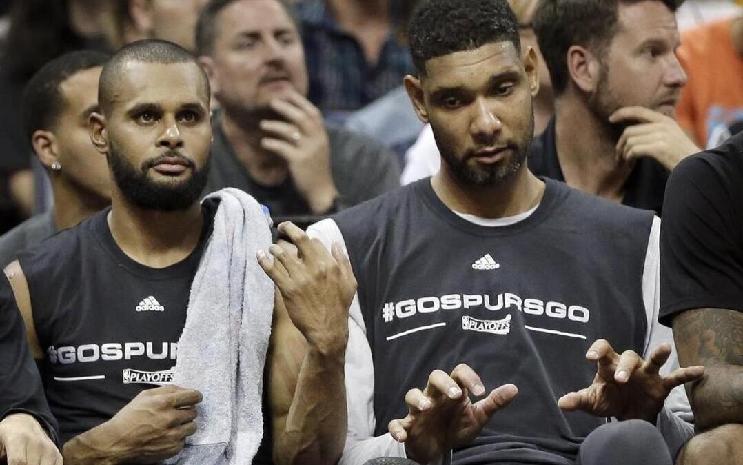 San Antonio Spurs guard Patty Mills, left, plays air guitar and center Tim Duncan, right, joins in on the keyboards during the second half of Game 4 against Memphis. The Spurs will play the Oklahoma City Thunder at 7:30 p.m. Saturday on TNT in Game 1 of the best-of-seven NBA playoff series.